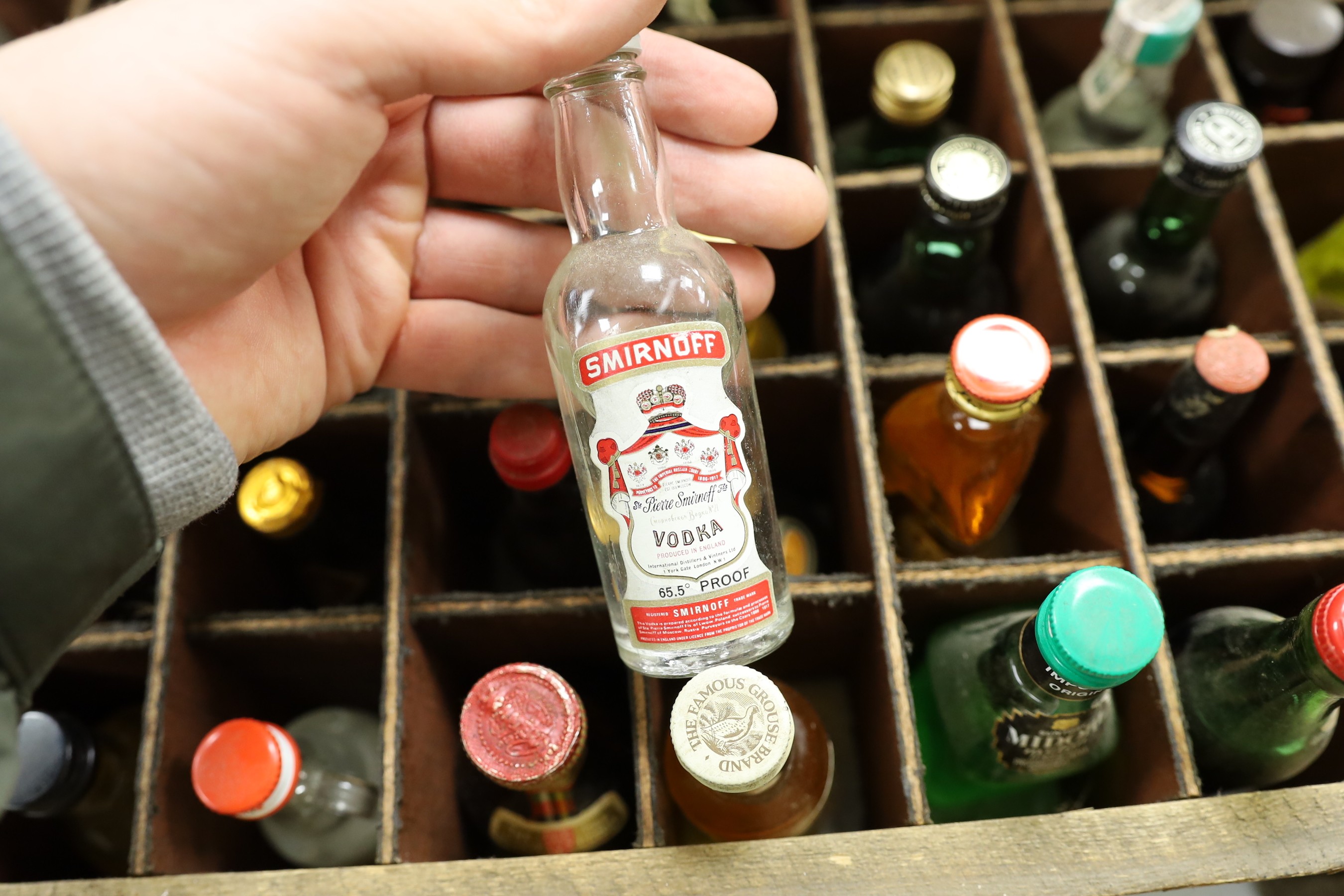Sixty miniature spirits in collectors wooden box